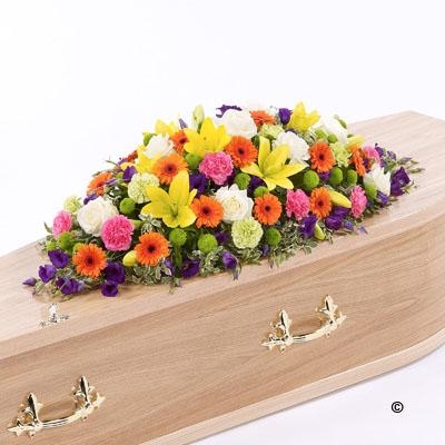 Vibrant Casket Spray with Yellow Lilies