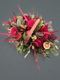 Christmas reds basket arrangement