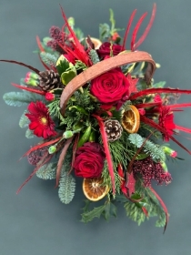 Christmas reds basket arrangement